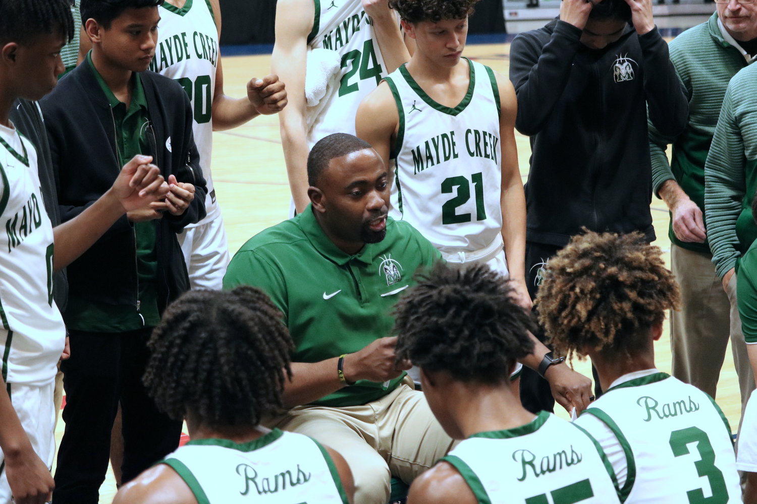 Mayde Creek head coach Anthony Fobb talks to his team during a timeout during Tuesday’s Class 6A regional quarterfinal between Mayde Creek and Fort Bend Clements at the Merrell Center.