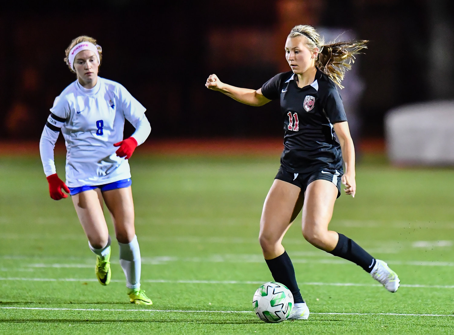 March 8, 2022: Katy's Hannah Phillips #11 passes the ball off during the Katy vs Katy Taylor soccer match at KHS. (Photo by Mark Goodman / Katy Times)