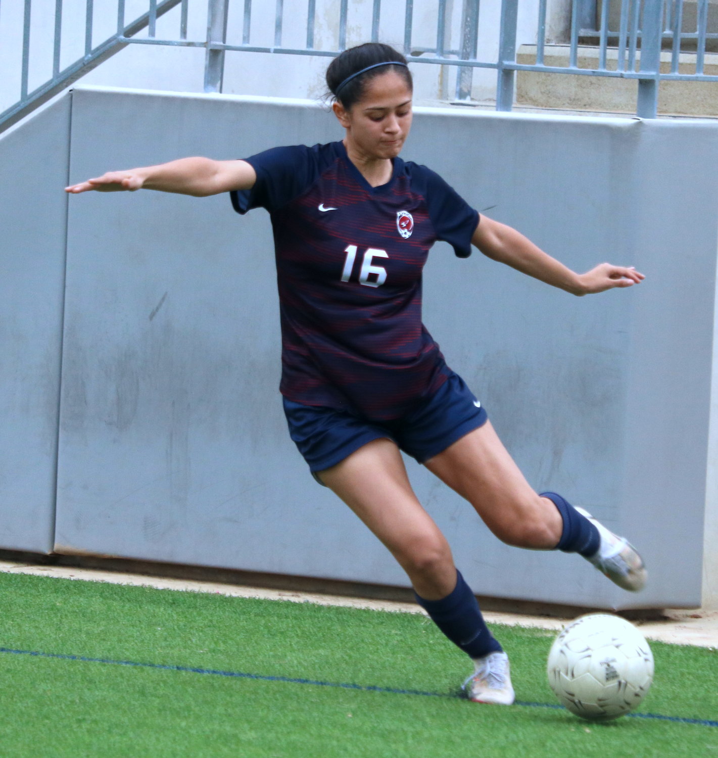 Rosa Reyes crosses the ball during Tuesday’s Class 6A area round game between Tompkins and Bellaire at Legacy Stadium.