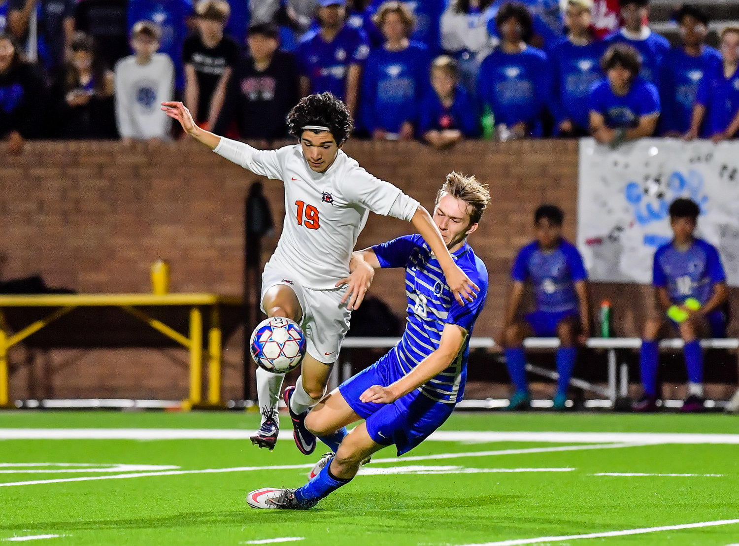 April 1, 2022: Seven Lakes Diego Flamenco #19 and Katy Taylors Lukas Piotrowicz #13 battle for the ball during Regional Quarterfinal soccer playoff, Seven Lakes vs Katy Taylor at Rhode Stadium. (Photo by Mark Goodman / Katy Times)