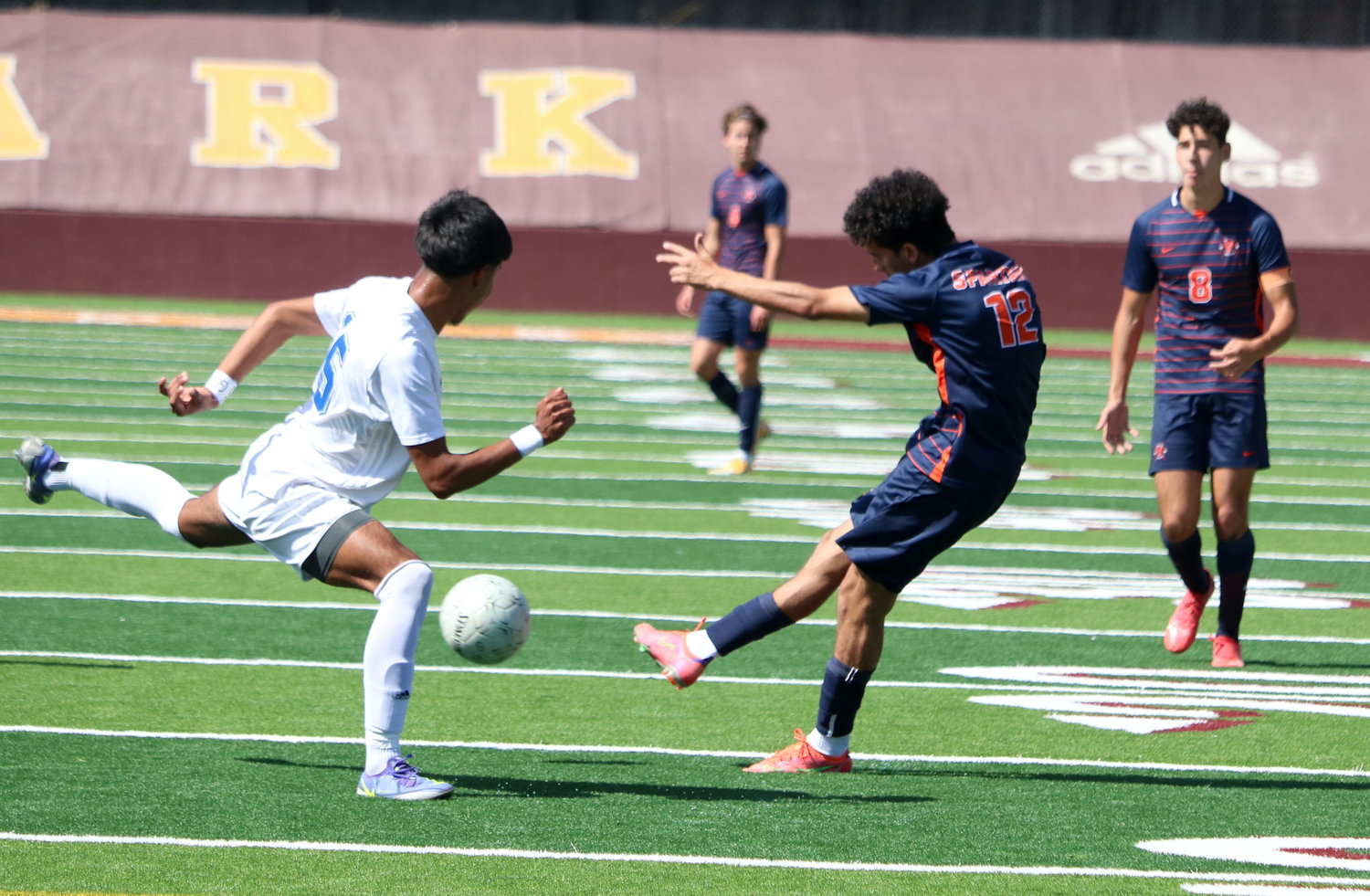 Abdullah Soliman crosses the ball during Saturday’s Class 6A Region III Final between Seven Lakes and Cy-Creek in Deer Park.