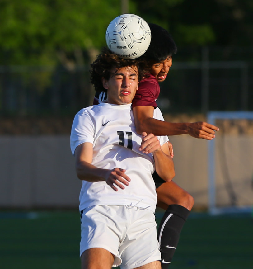 Jordan forward Hani Taan (11) heads the ball during the Class 5A boys state semifinal between Dripping Springs and Katy Jordan on April 14, 2022 in Georgetown, Texas.