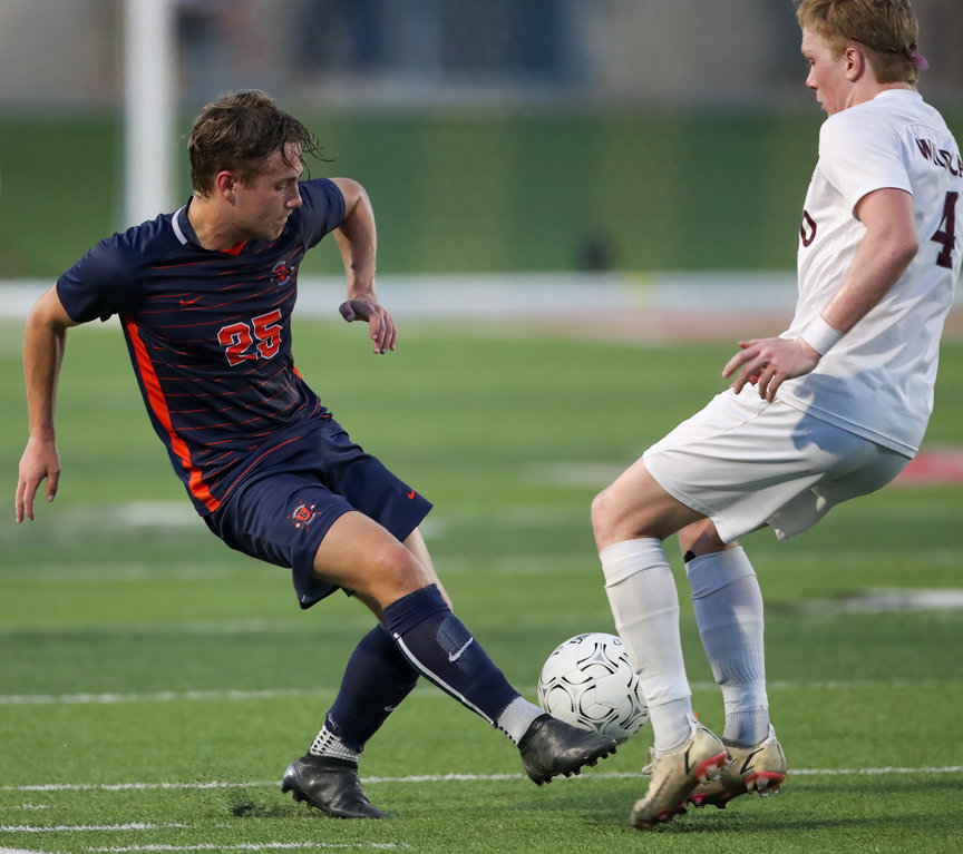 Seven Lakes defender TJ Jennings (25) passes the ball during the Class 6A boys state semifinal between Katy Seven Lakes and Plano on April 15, 2022 in Georgetown, Texas.