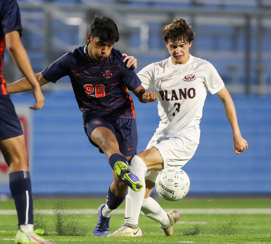 Seven Lakes midfielder Alexis Matute (20) works against Plano midfielder Aiden Ussery (3) during the Class 6A boys state semifinal between Katy Seven Lakes and Plano on April 15, 2022 in Georgetown, Texas.