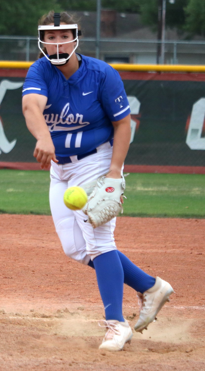 Ariana Hughes pitches during Tuesday’s game between Katy and Taylor at the Katy softball field.