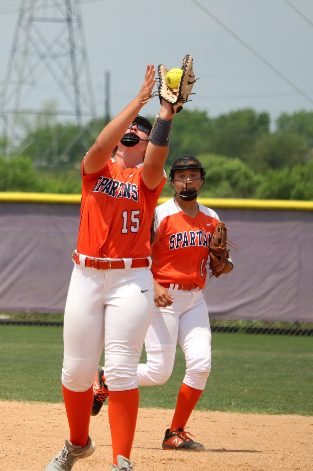 Ashley Abel makes a catch at second base during Saturday’s bi-district round game between Seven Lakes and Ridge Point at the Ridge Point softball field.