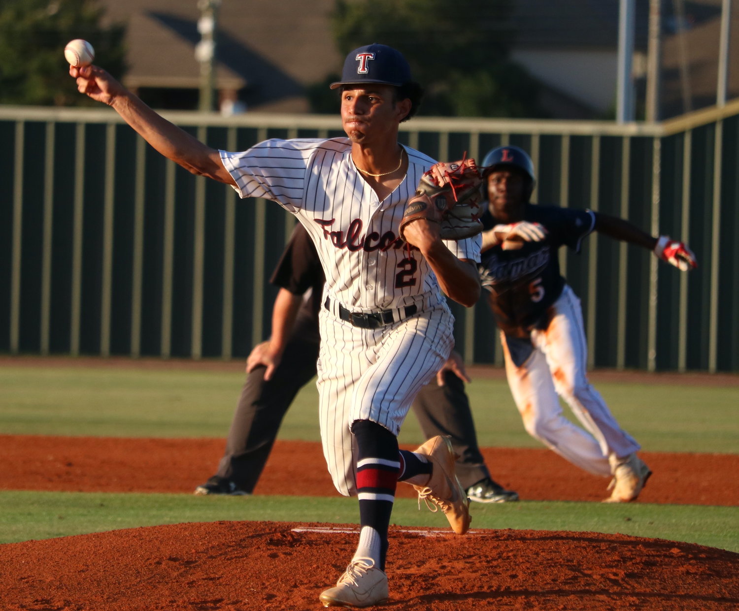 Trevor Esparza pitches during Thursday’s Class 6A area round game between Tompkins and Lamar at the Tompkins baseball field.