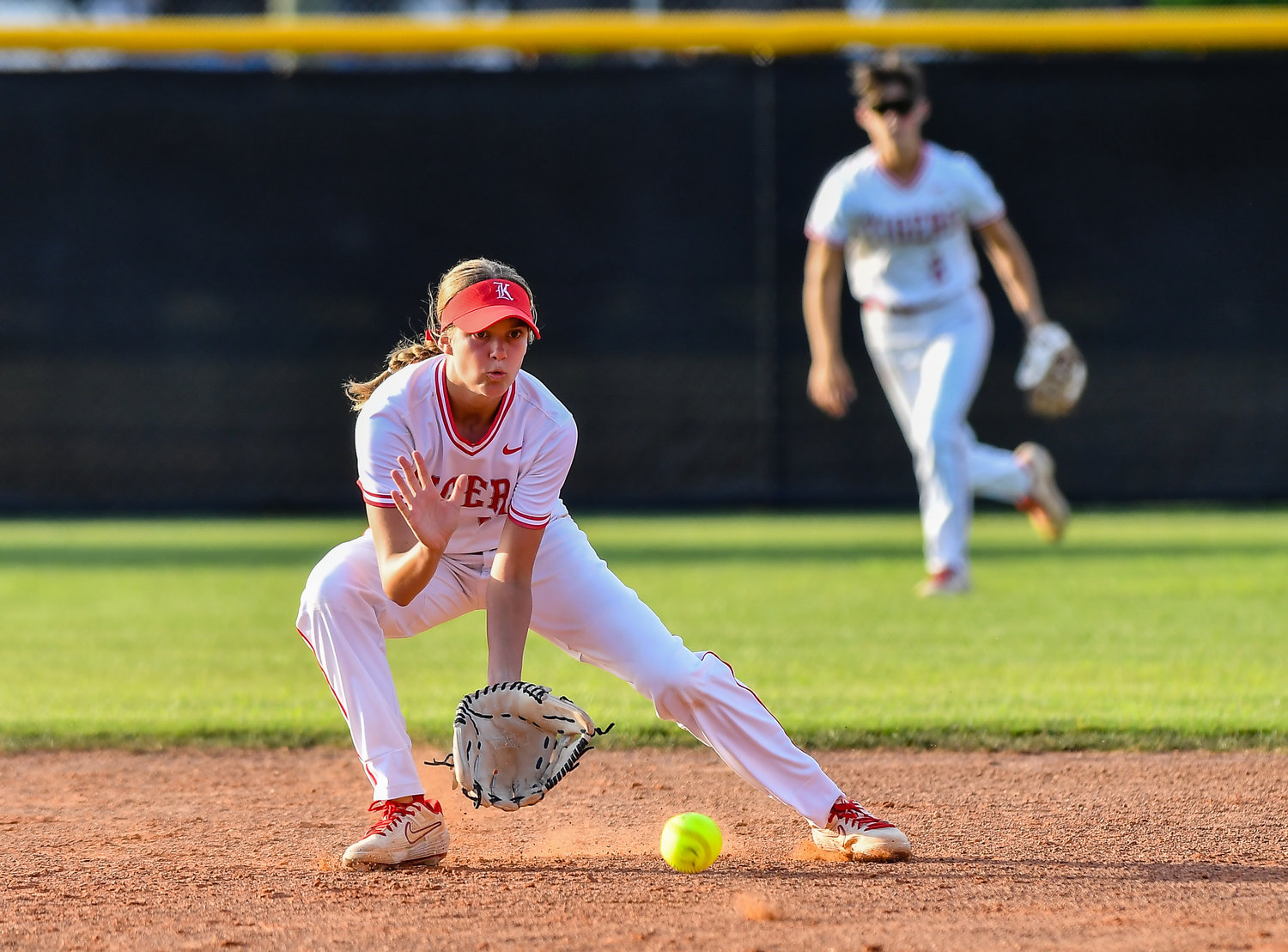May 13, 2022: Katy's Avery Porter #12 fields a ground ball during the Regional Quarterfinal playoff between Katy and Cinco Ranch at Katy HS. (Photo by Mark Goodman / Katy Times)