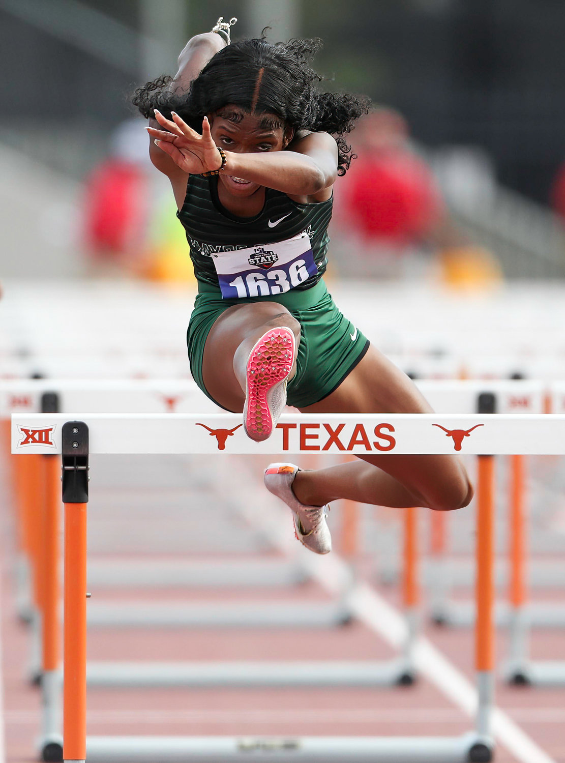 Simone Ballard of Mayde Creek runs in the Class 6A girls 100-meter hurdles at the UIL State Track and Field Meet on May 14, 2022 in Austin, Texas. Ballard earned a gold medal in the event with a time of 13.33.