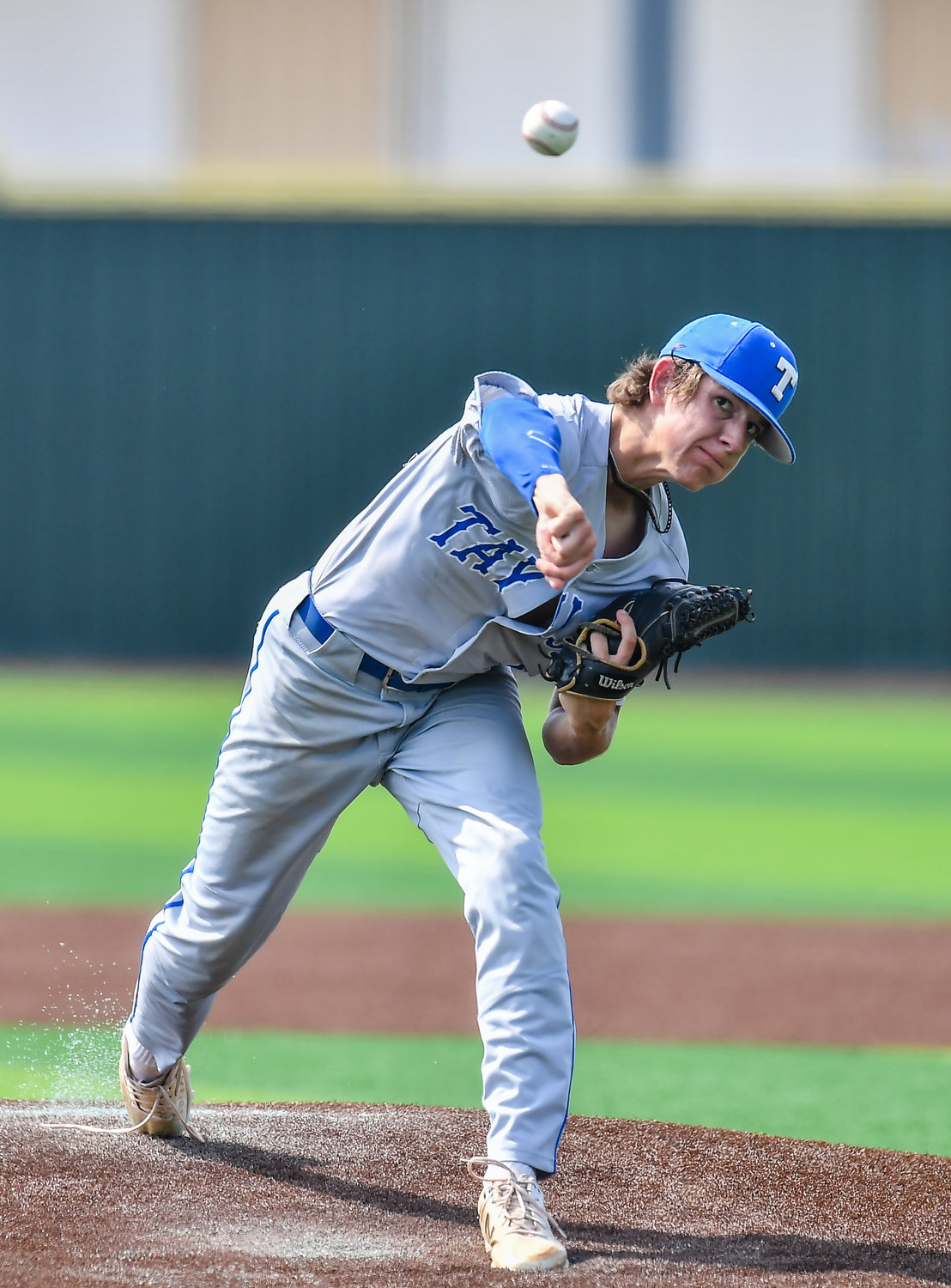 Katy Taylor's Jared Schaeffer (12) starting pitcher, pitches during the first inning during a Region III-6A quarterfinals baseball game at Langham Creek High School, Saturday, May 21, 2022.