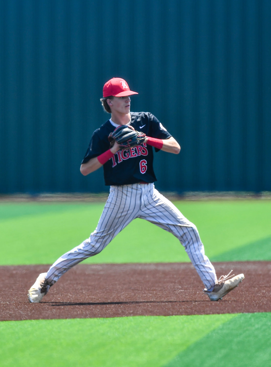 Katy's Josh Dunayczan (6) makes the throw to first for the out during the sixth inning of game three during a Region III-6A Regional SemiFinals baseball game between Katy and Strake Jesuit at Jersey Village High School, Saturday, May 28, 2022.