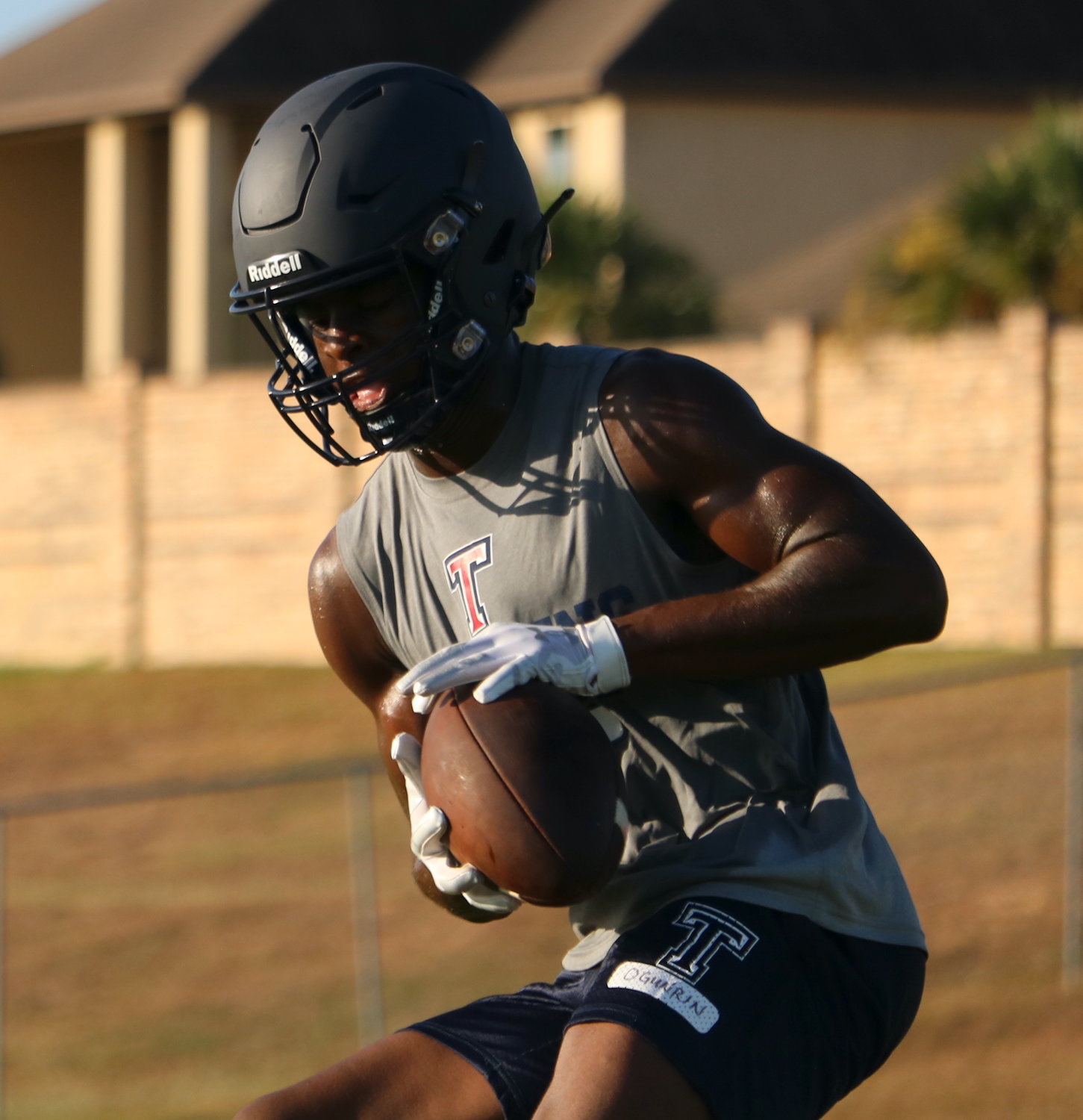 Tompkins’ Matthew Ogunrin catches a pass during Tuesday’s practice.