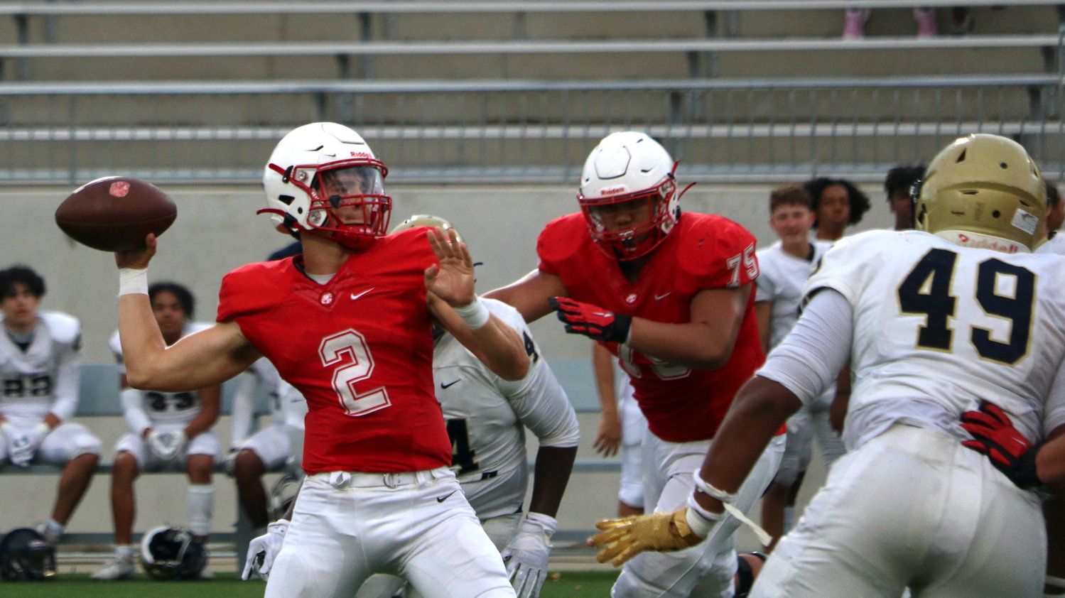 Katy’s Caleb Koger makes a pass during Katy’s scrimmage against Klein Collins on Friday at Legacy Stadium.