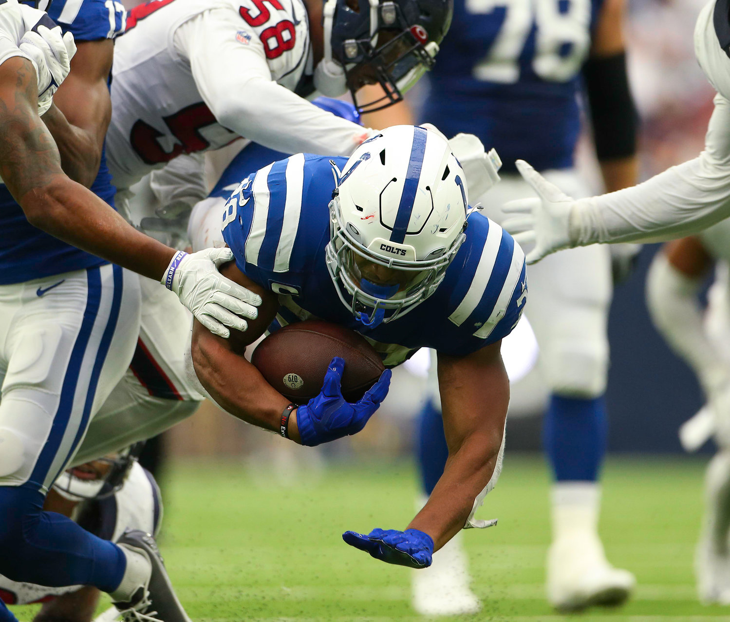 Indianapolis Colts running back Jonathan Taylor (28) dives forward for yardage during an NFL game between the Texans and the Colts on September 11, 2022 in Houston. The game ended in a 20-20 tie after a scoreless overtime period.