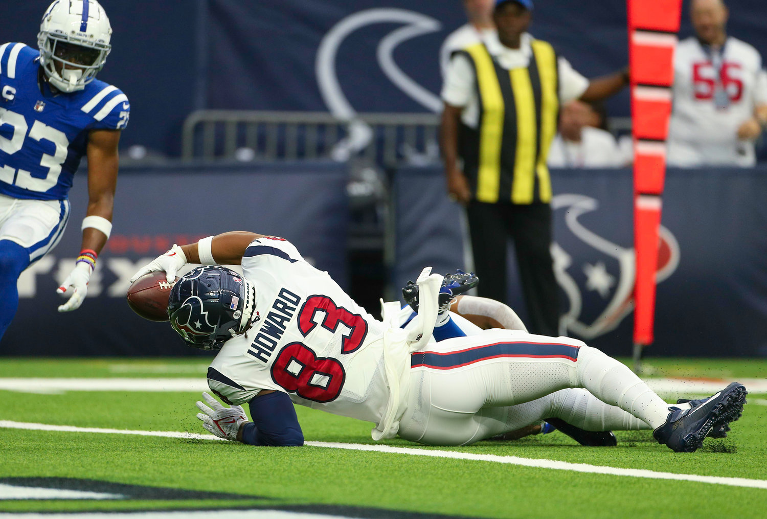 Houston Texans tight end O.J. Howard (83) leans across the goal line for a touchdown on a 16-yard touchdown reception during an NFL game between the Texans and the Colts on September 11, 2022 in Houston. The game ended in a 20-20 tie after a scoreless overtime period.