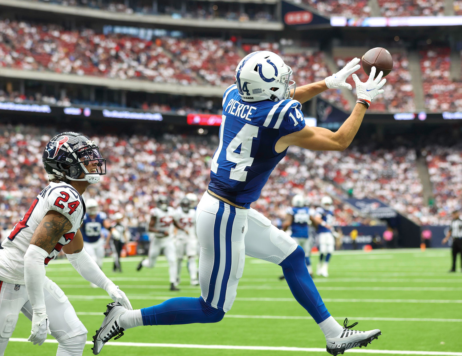 Indianapolis Colts wide receiver Alec Pierce (14) drops a would-be touchdown pass in the end zone during an NFL game between the Texans and the Colts on September 11, 2022 in Houston. The game ended in a 20-20 tie after a scoreless overtime period.