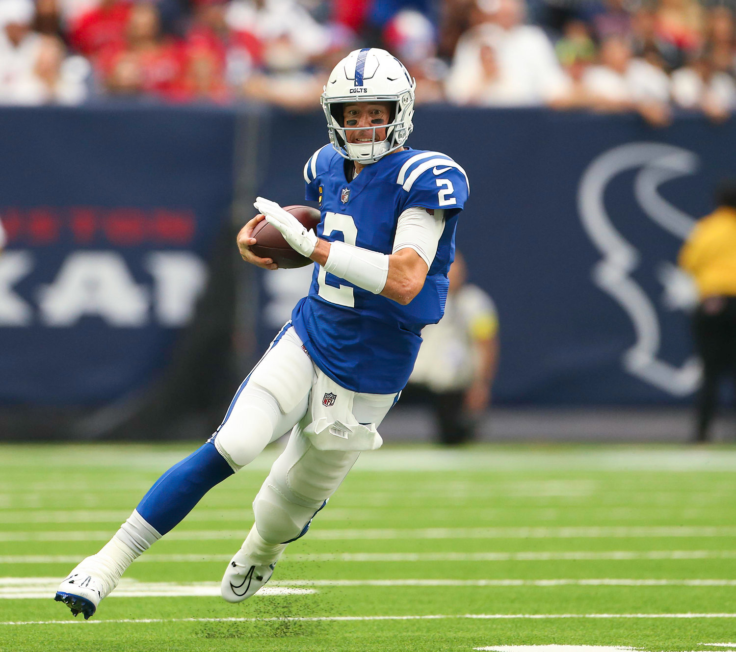 Indianapolis Colts quarterback Matt Ryan (2) runs for a first down during an NFL game between the Texans and the Colts on September 11, 2022 in Houston. The game ended in a 20-20 tie after a scoreless overtime period.