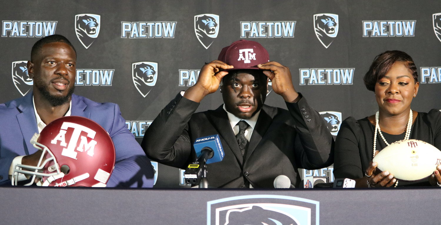 David Hicks Jr. announces his commitment to Texas A&M on Wednesday at Paetow High School.