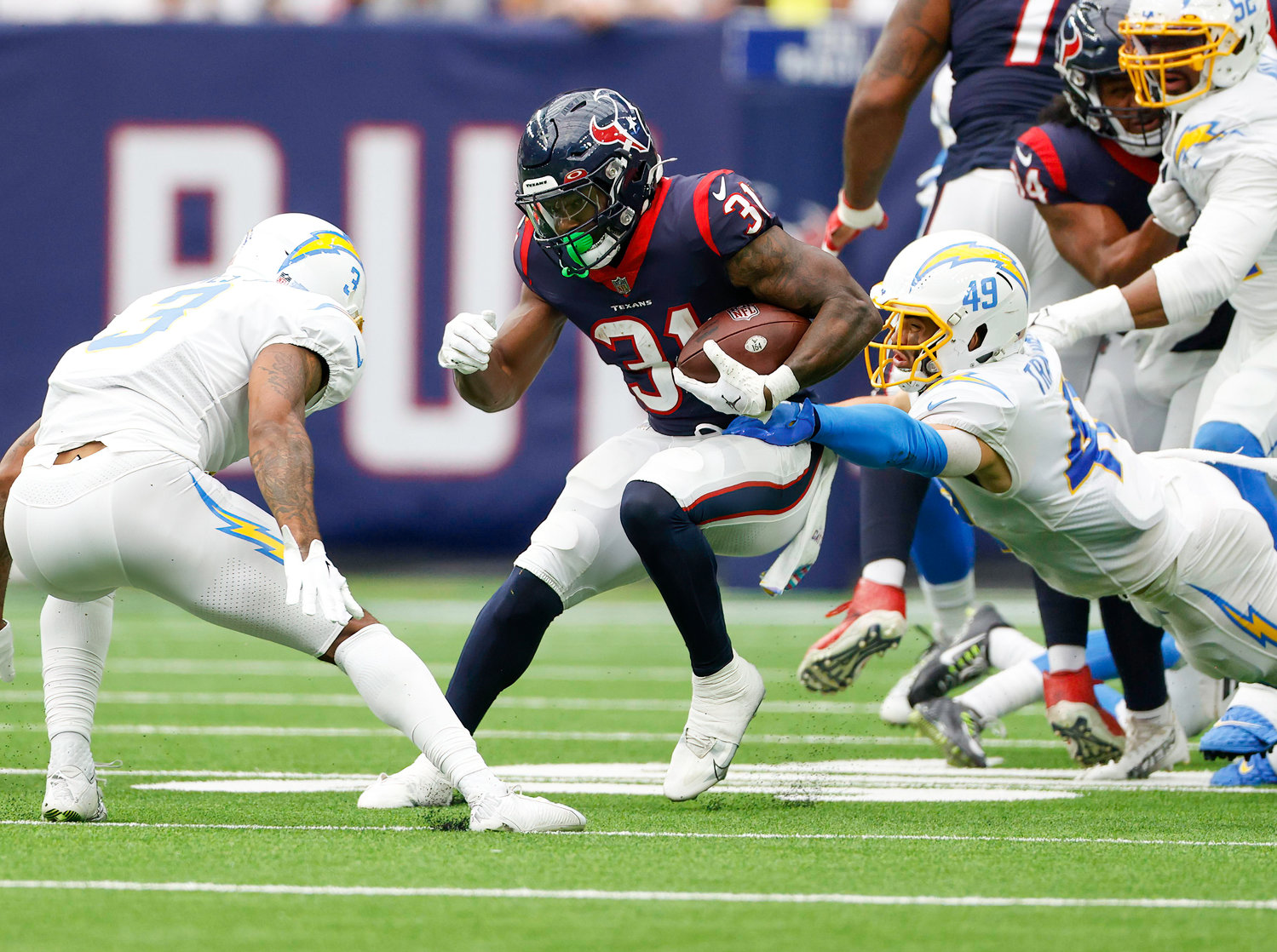 Texans running back Dameon Pierce (31) carries the ball during an NFL game between the Texans and the Chargers on Oct. 2, 2022 in Houston. The Chargers won 34-24.