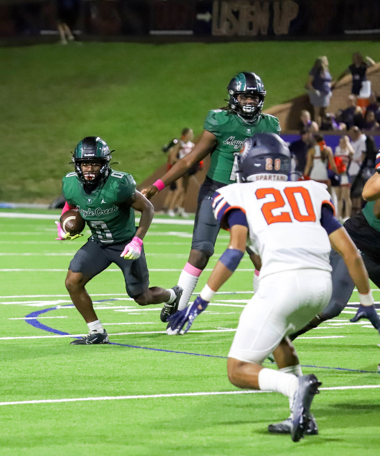 Mayde Creek's Eric Nelson runs the ball during Friday's game between Seven Lakes and Mayde Creek at Rhodes Stadium.