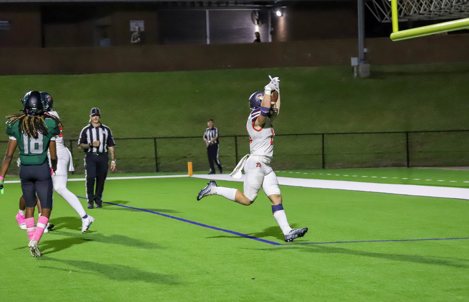 Seven Lakes' Jake Farris scores a touchdown during Friday's game between Seven Lakes and Mayde Creek at Rhodes Stadium.