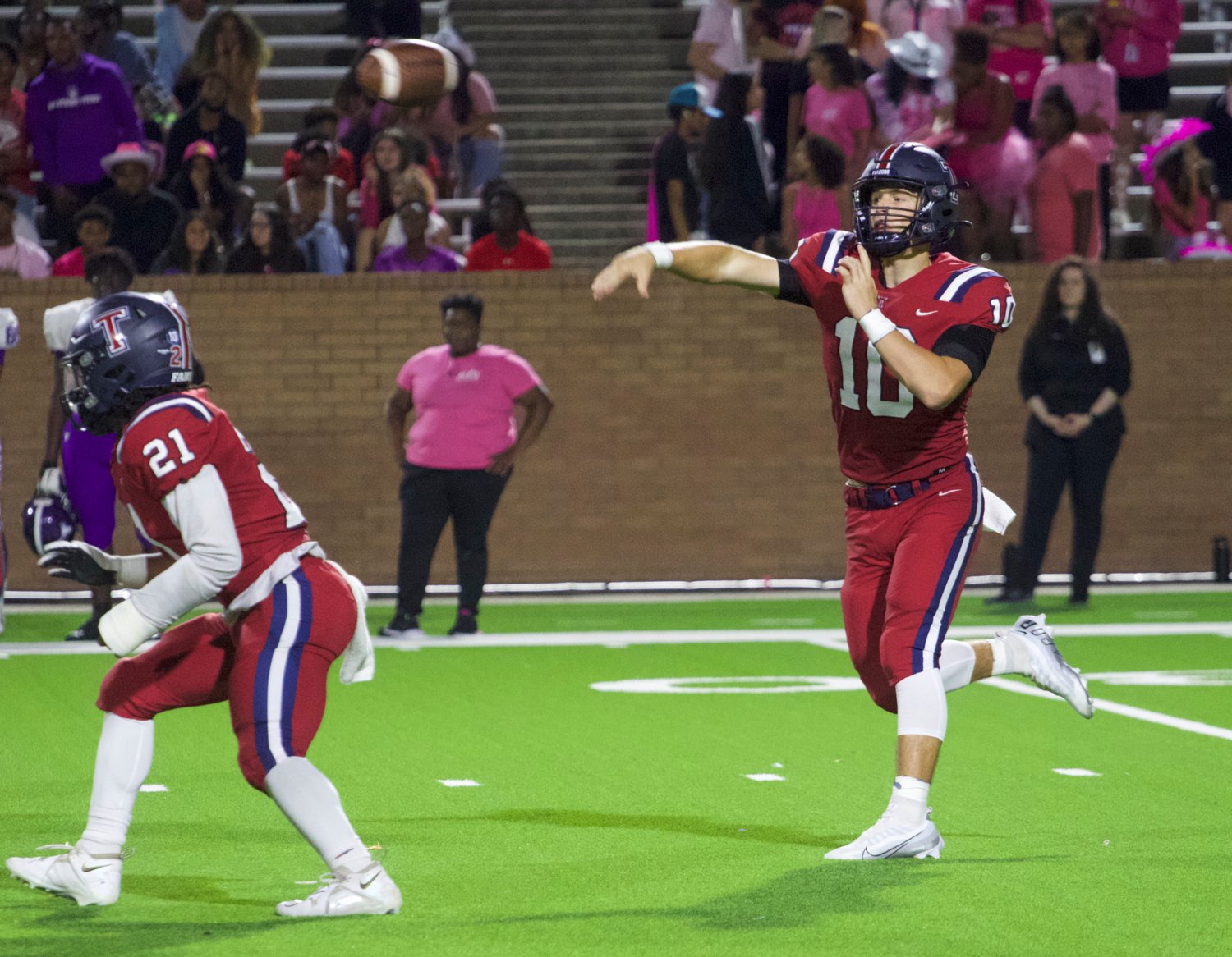 Wyatt Young passes a ball during Thursday's game between Tompkins and Morton Ranch at Rhodes Stadium.