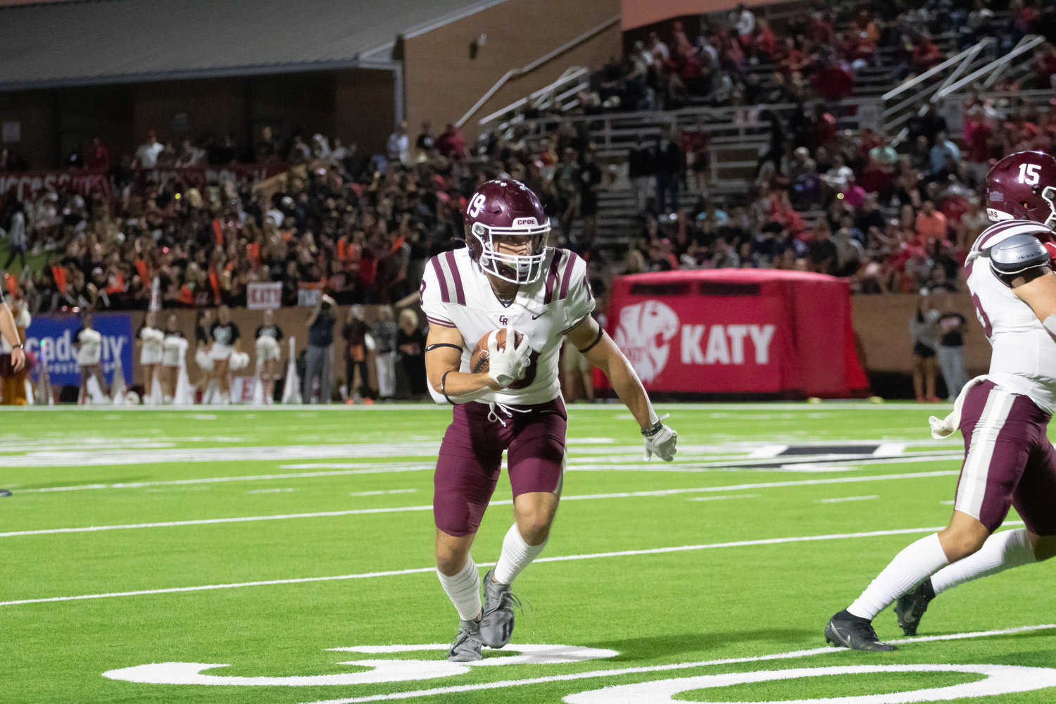 Cinco Ranch's Noah Abboud tries to run upfield during Friday's game between Katy and Cinco Ranch at Rhodes Stadium.