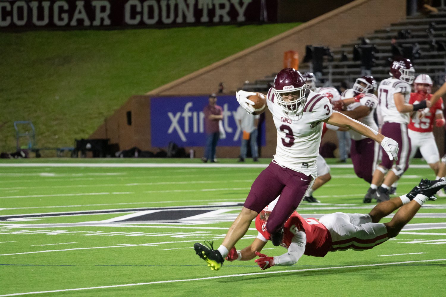 Cinco Ranch's Seth Salverino breaks a tackle during Friday's game between Katy and Cinco Ranch at Rhodes Stadium.