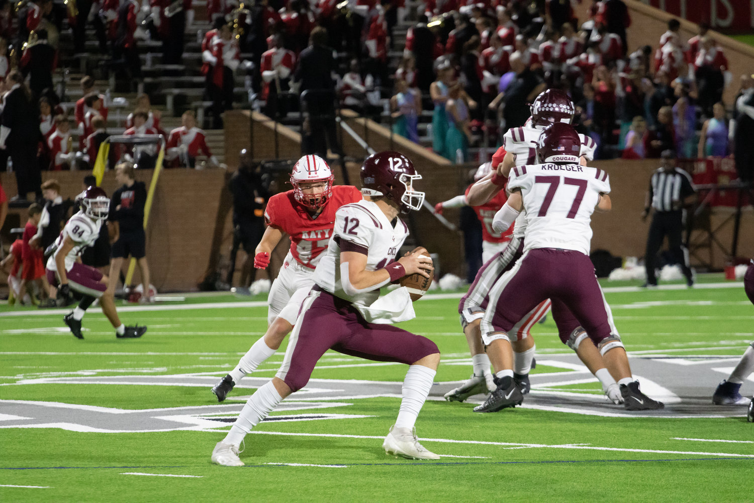Cinco Ranch quarterback Gavin Rutherford drops back to pass during Friday's game between Katy and Cinco Ranch at Rhodes Stadium.