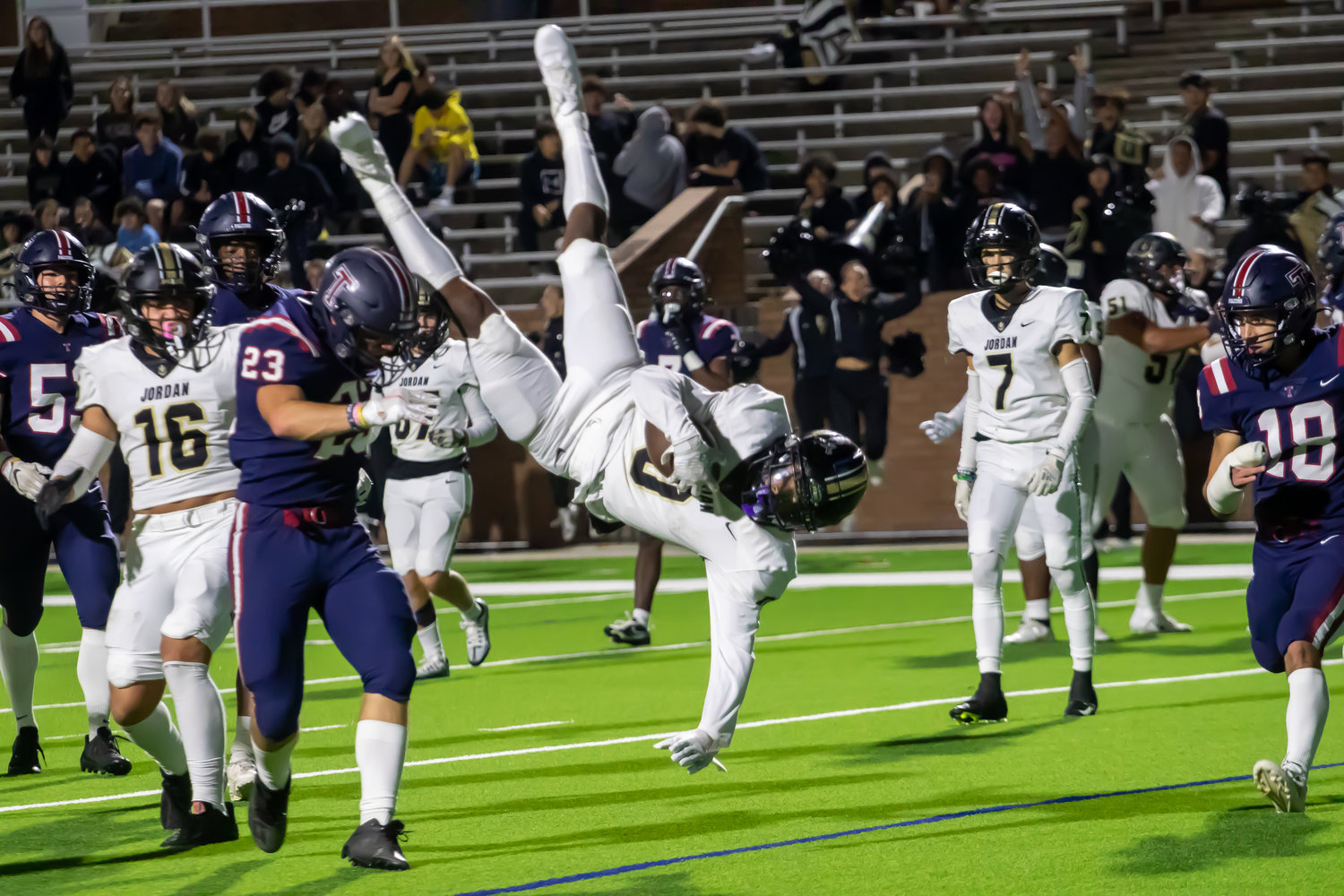 Jordan's Zion Jones dives into the endzone for a touchdown during Friday's game between Tompkins and Jordan at Rhodes Stadium.