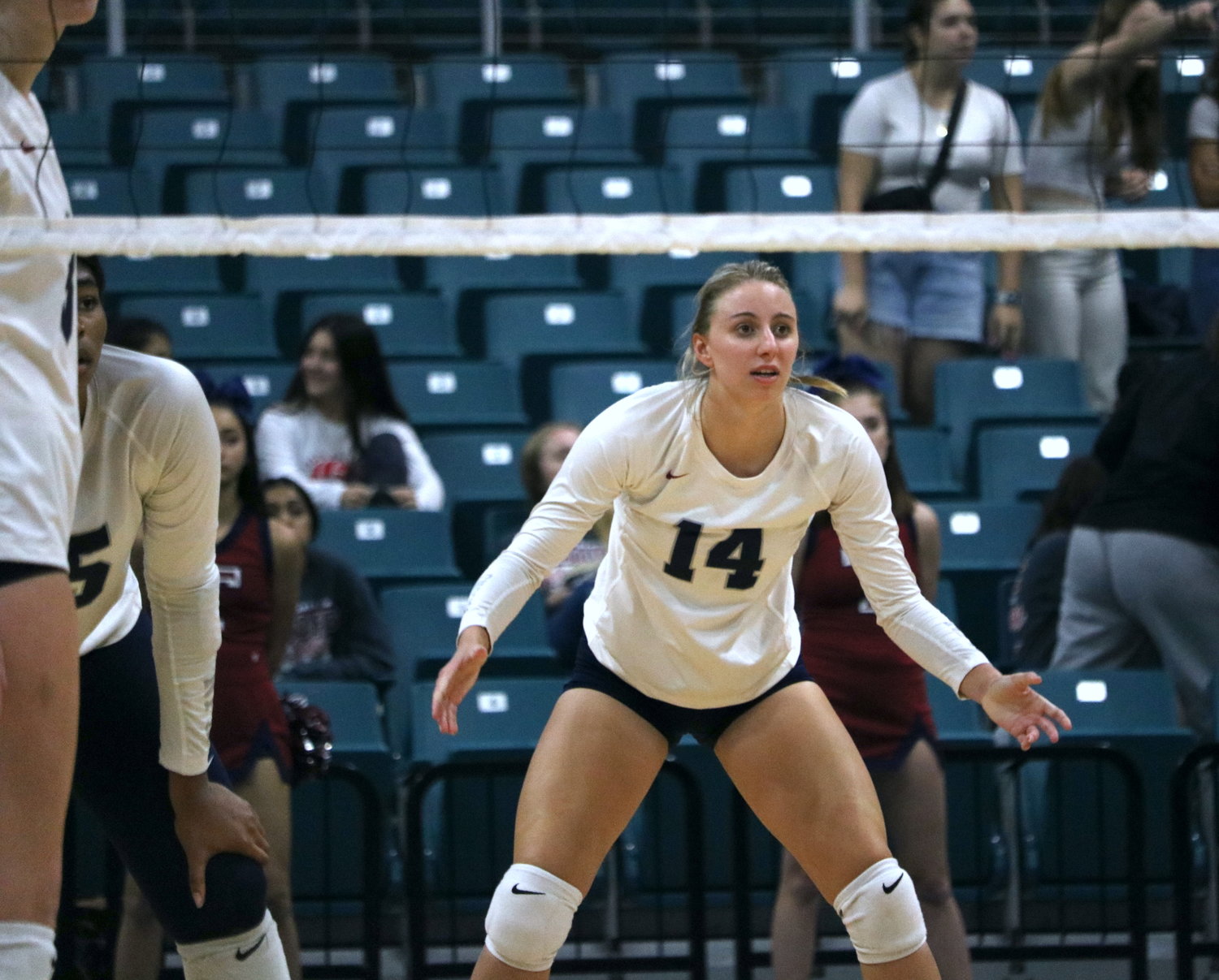 Skylar Skrabanek prepares for an incoming serve during Tuesday’s bi-district playoff game between Tompkins and Fort Bend Austin at the Merrell Center.