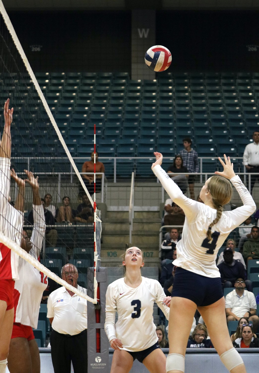 Callie Funk sets up to spike the ball during Tuesday’s bi-district playoff game between Tompkins and Fort Bend Austin at the Merrell Center.