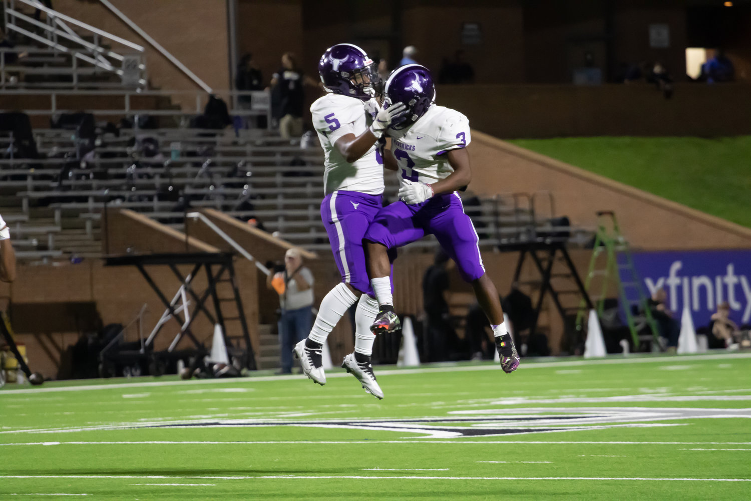 Morton Ranch's Santana Scott and Amiri Jack celebrate after Jack make an interception which he returned for a touchdown.