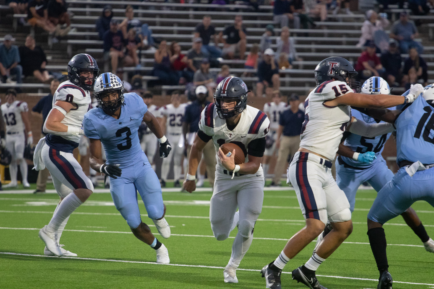 Tompkins' Wyatt Young runs during a game between Tompkins and Paetow at Rhodes Stadium.