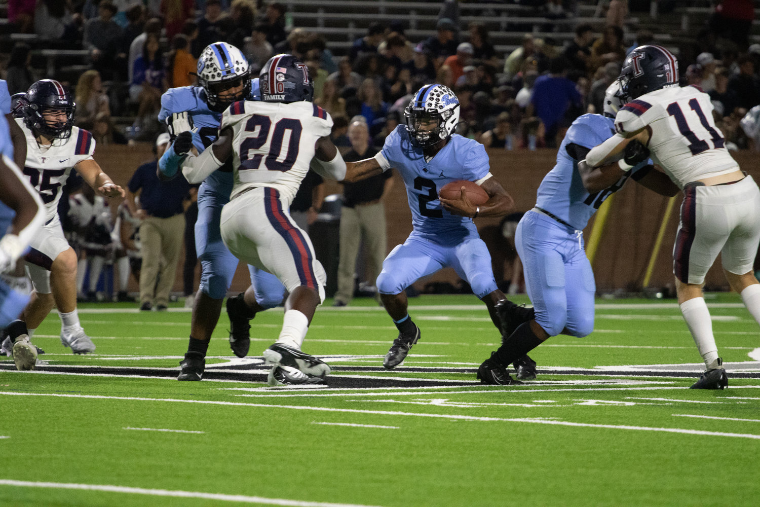 Paetow's Derrick Johnson runs the ball during Friday's game between Tompkins and Paetow at Rhodes Stadium.