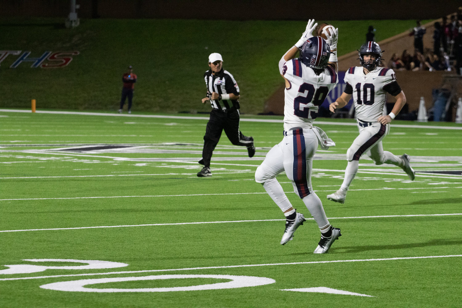 Tompkins' Dylan Rodriguez catches a pass during Friday's game between Tompkins and Paetow at Rhodes Stadium.