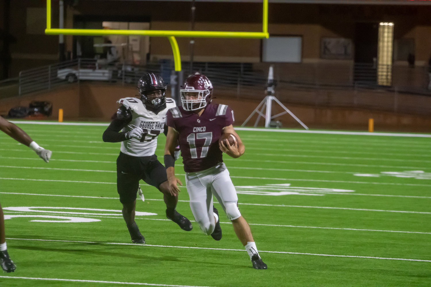 Eric Eckstrom runs toward the open field during Friday's game between Cinco Ranch and George Ranch at Rhodes Stadium.