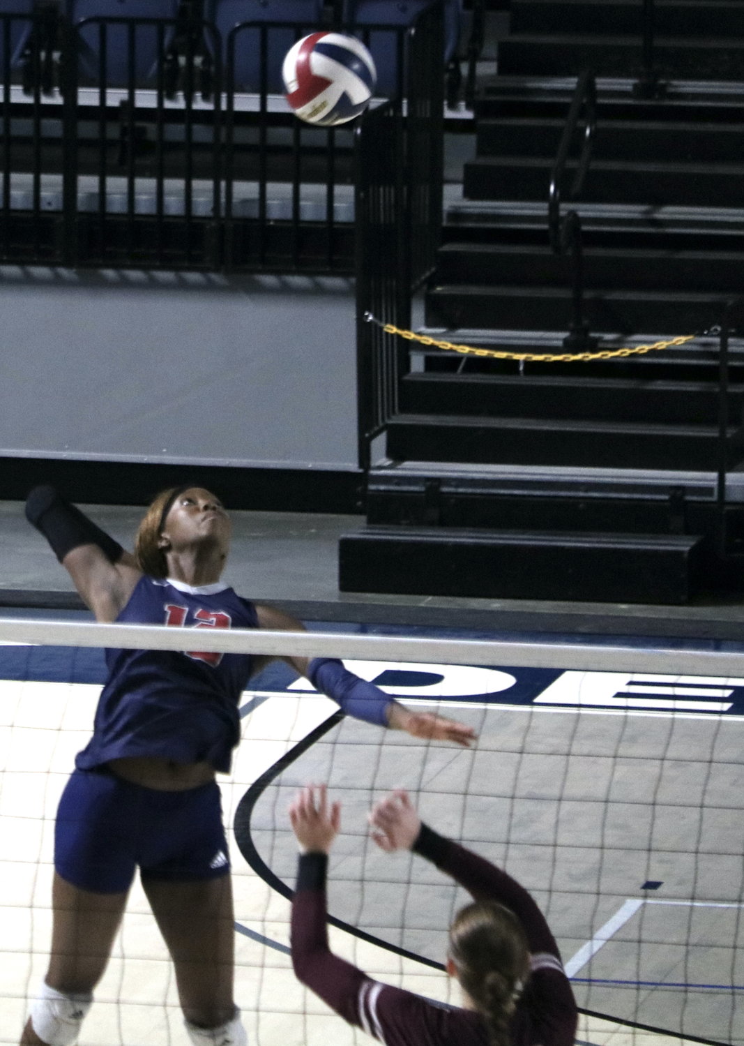 Cindy Tchouangwa spikes a ball during Saturday’s Class 6A-Region III Final against Cinco Ranch at Delmar Fieldhouse.