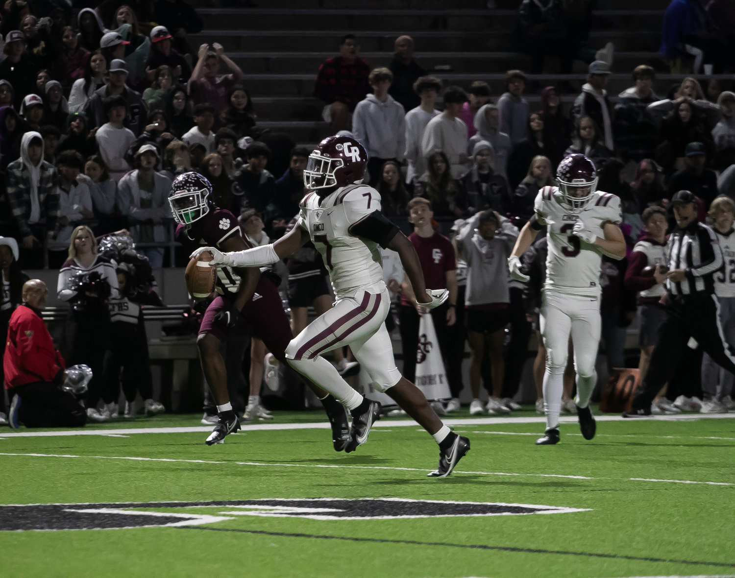 Sam McKnight runs in a touchdown during Friday's Class 6A-Division I area round game between Cinco Ranch and Cy-Fair at Pridgeon Stadium.
