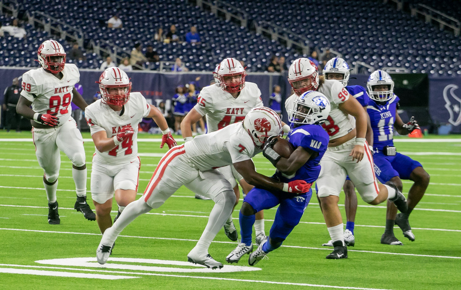 Katy's Johnathan Hall makes a tackle during a Class 6A-Division II Region III Final between Katy and C.E. King at NRG Stadium.