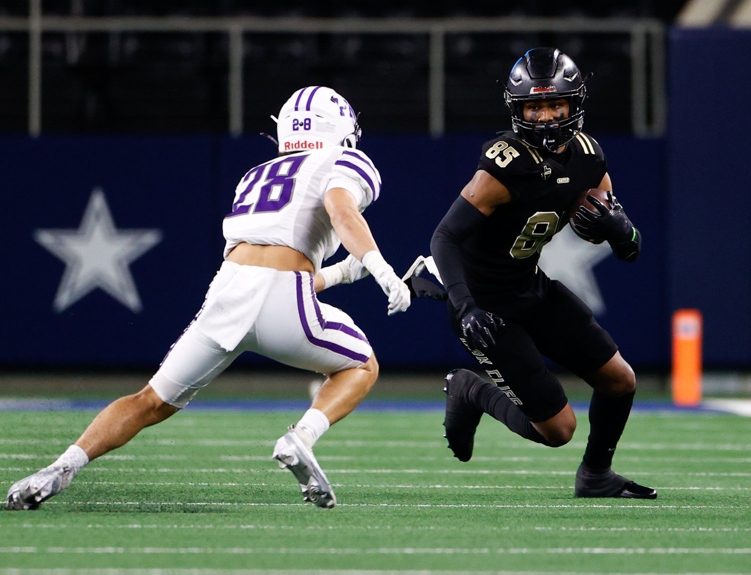 South Oak Cliff wide receiver Joshua Manley (85) carries the ball after a catch during the Class 5A Division II football state championship game between South Oak Cliff and Port Neches-Groves in Arlington, Texas, on Dec. 16, 2022.