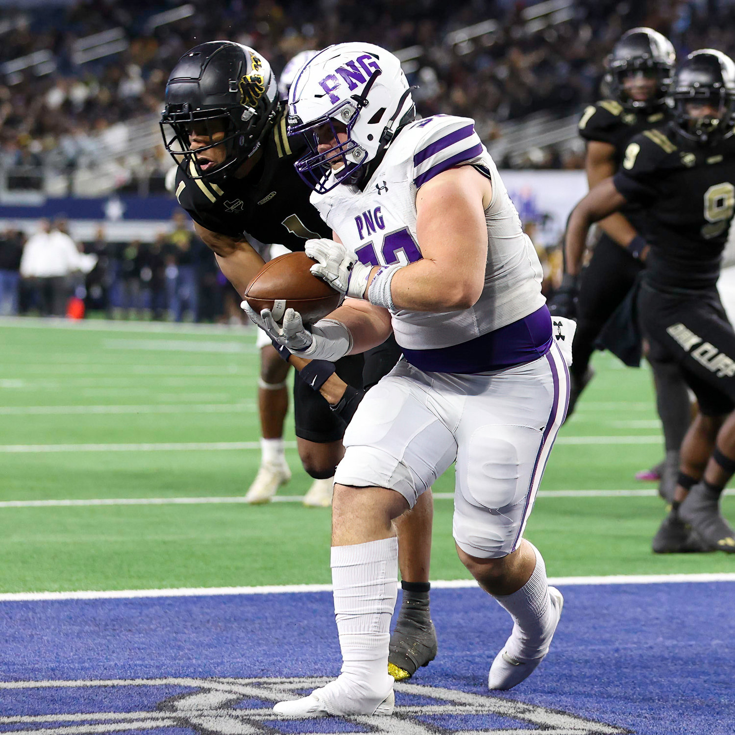 Port Neches-Groves tight end Brock Hebert (32) makes a touchdown catch in the fourth quarter of the Class 5A Division II football state championship game between South Oak Cliff and Port Neches-Groves in Arlington, Texas, on Dec. 16, 2022.
