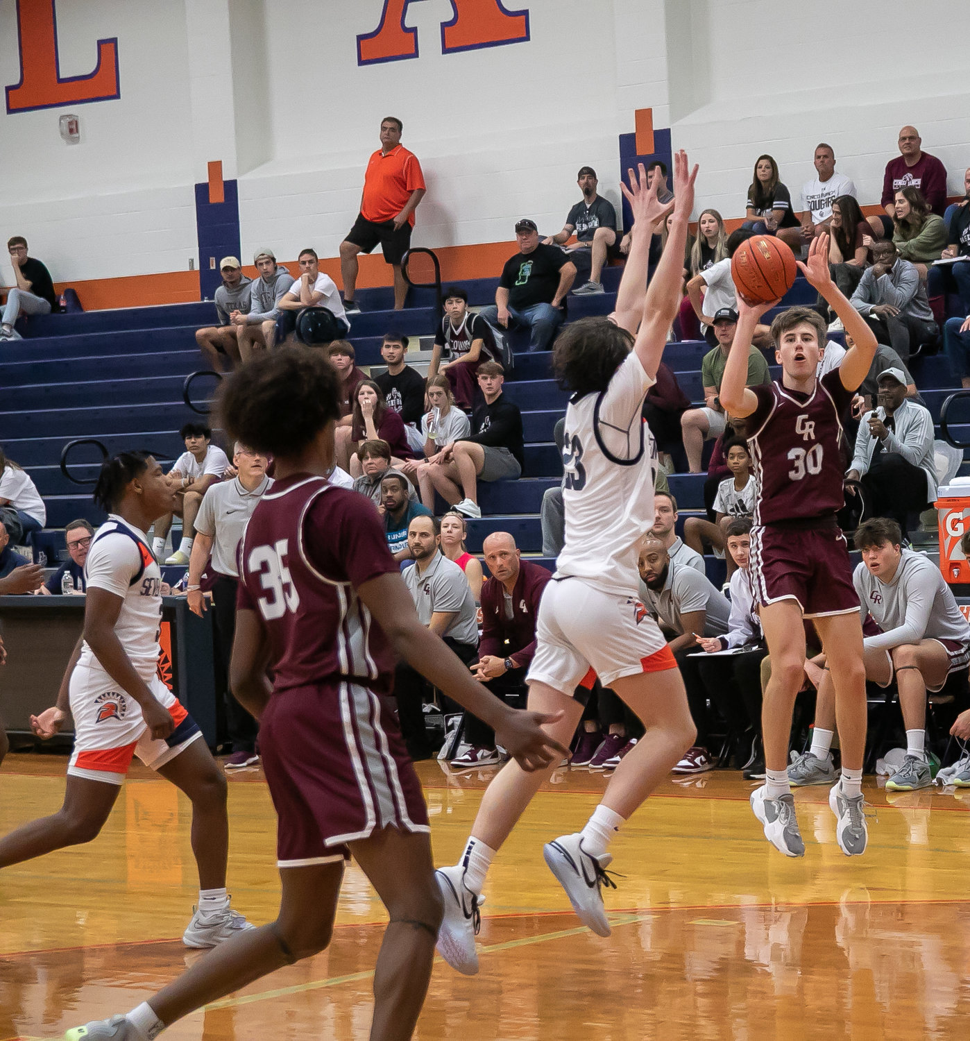 Drew Joyce shoots a 3-pointer during Saturday's game between Seven Lakes and Cinco Ranch at the Seven Lakes gym.