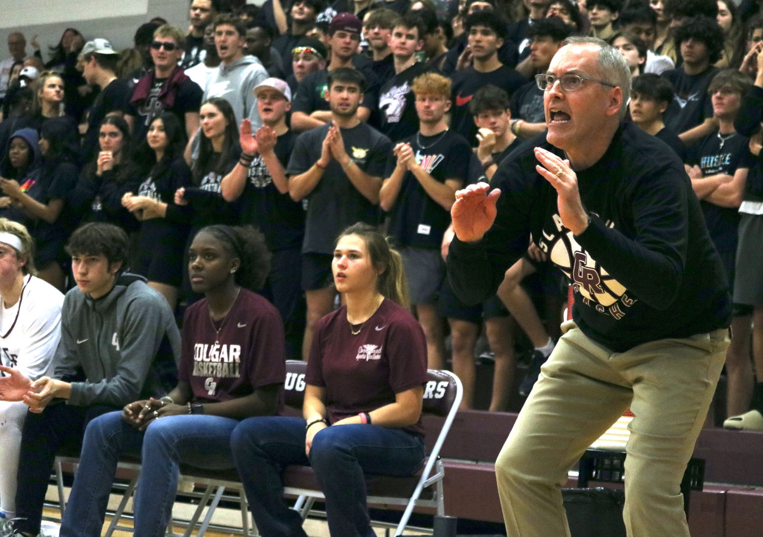 Neil King talks to his team during Wednesday's game between Cinco Ranch and Taylor at the Cinco Ranch gym.