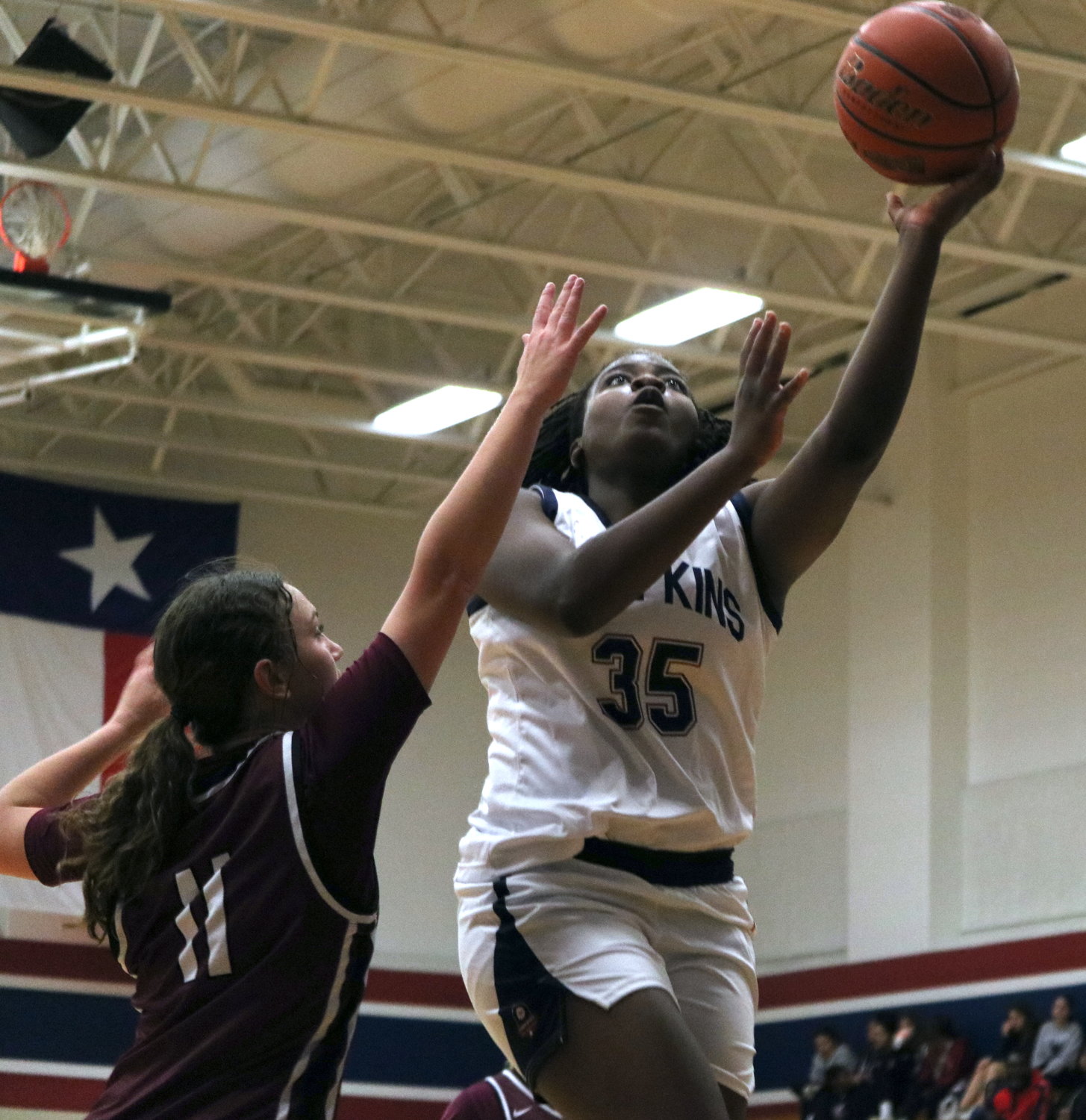 Fiyin Adeleye shoots a layup during Friday’s game between Tompkins and Cinco Ranch at the Tompkins gym.