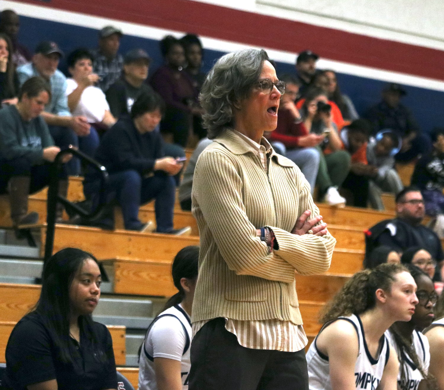 Tompkins head coach Tamatha Ray talks to her team during Friday’s game between Tompkins and Cinco Ranch at the Tompkins gym.