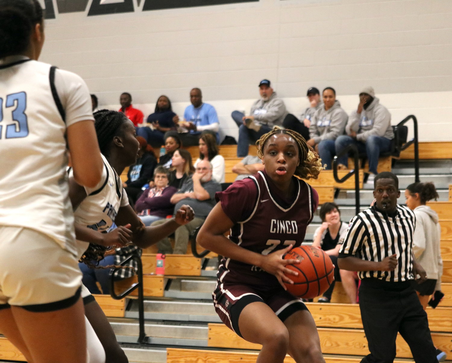 Aniya Foy drives the baseline during Friday's game between Cinco Ranch and Paetow at the Paetow gym.