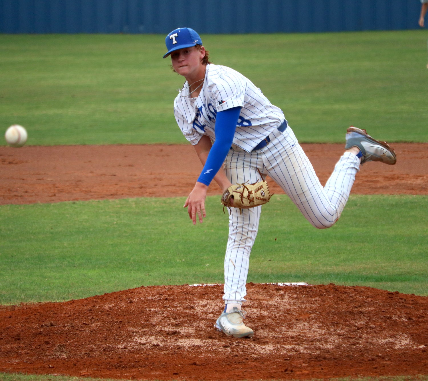 Bryce Krenek pitches during Thursday's game between Taylor and Seven Lakes at the Taylor baseball field.