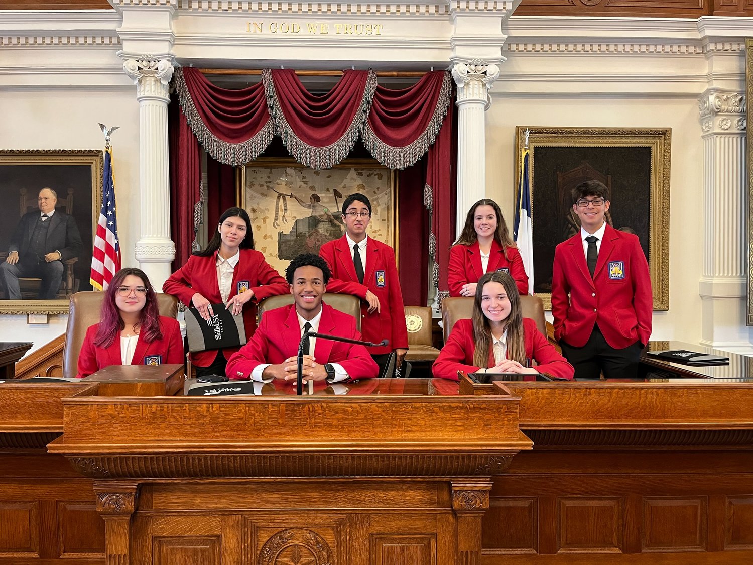 The students also visited the Texas House of Representatives, where they participated in mock debates using parliamentary procedures they learned. Here they are pictured at the speaker’s rostrum in the House chamber. Directly behind the students is the battle flag flown during the Battle of San Jacinto on April 21, 1836. The portrait on the left is of Gov. James Stephen Hogg, the first native-born governor of Texas. He served from 1891-95.