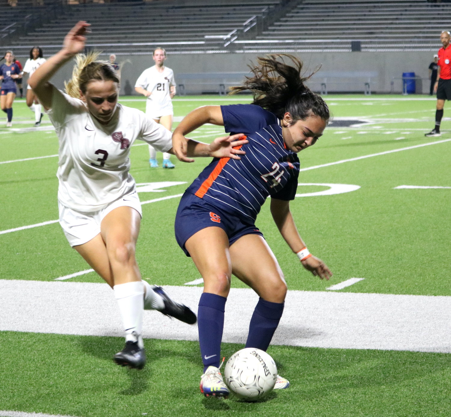 Allison Zuniga takes the ball away from a George Ranch player during Friday's bi-district game between Seven Lakes and George Ranch at Legacy Stadium.